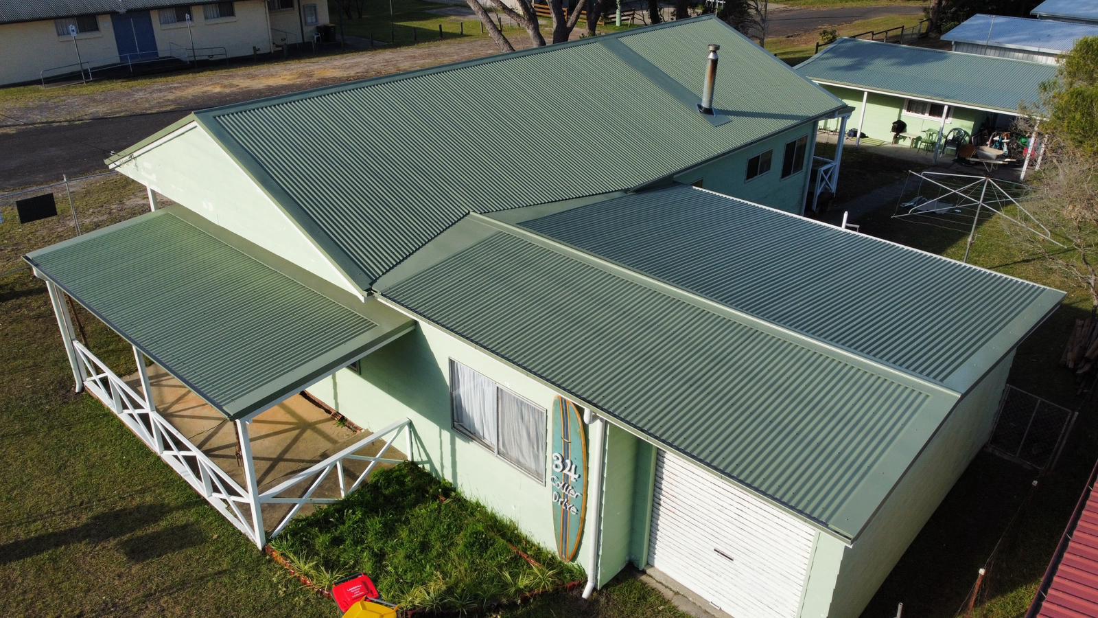 Green roofed house aerial view