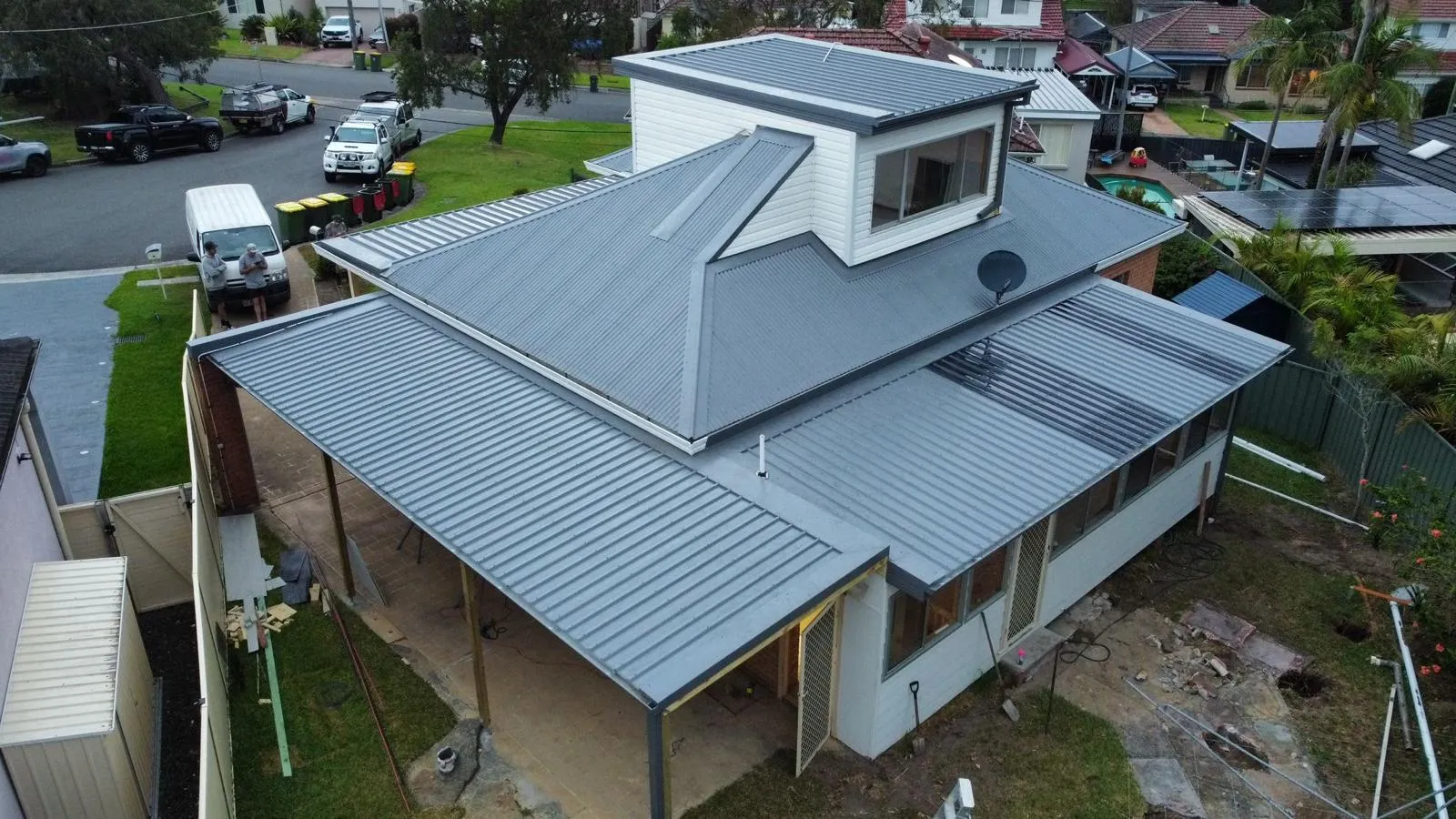 Gray metal roof on suburban house